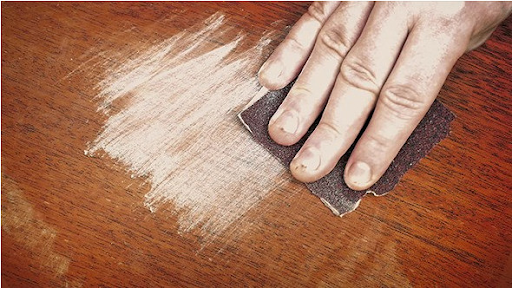 Cửa thép vân gỗ bị trầy xước thì xử lý thế nào?